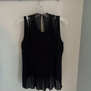 Sleeveless black dress blouse